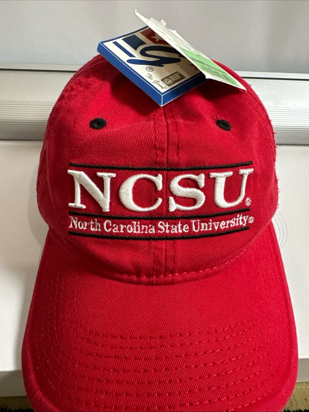The Game Red Baseball Cap with White Embroidered Patch North Carolina State
